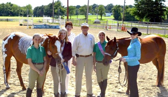 L-R: Gloucester County Equine Science Team member Molly Worek; Lamont; Equestrian of the Year Angela Howard; Rutgers Equine Science Center Director Karyn Malinowski; NJ Secretary of Agriculture Douglas Fisher; team member Haley La Falce; Joey; and Cecilia Floyd at the Gloucester County 4-H Fairgrounds.