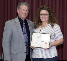 Anita Wagner accepts the Excellence Award for Support Staff.
