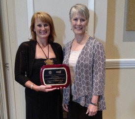 Carey Williams receiving the 2015 Equine Science award, presented by Connie Larson from Zinpro Corporation, at the American Society of Animal Sciences annual meeting.