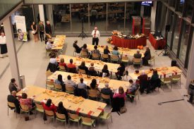 Executive dean Bob Goodman addresses participants at culinary health and wellness event.