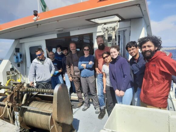 Group of reseachers on a boat
