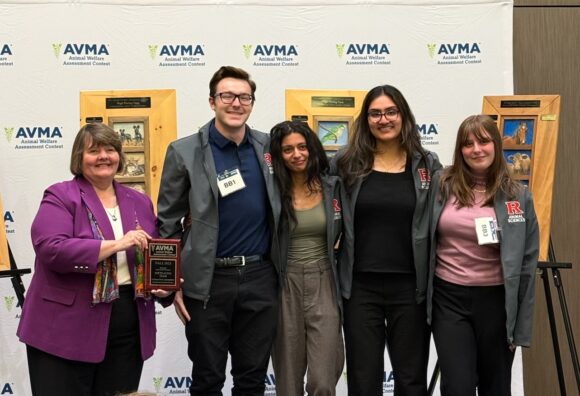 A group of people posing for a photo at the competition