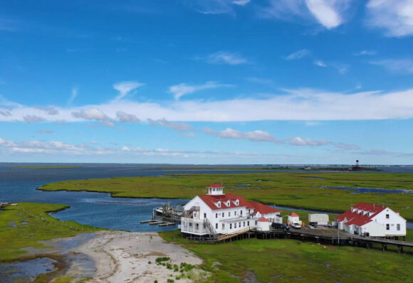 A building used as a marine research facility is located near an inlet and marshes