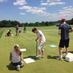 Clarke's students conducting field research sampling. Photo credit: Bruce Clarke. Students taking samples of turf disease