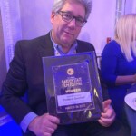 Distinguished Professor James Simon with the award.