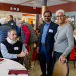 Retirees posing for a photo together