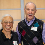 Two people smiling for a photo together