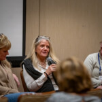 A speaker talking to a group