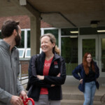 Two people having a conversation on Rutgers Day
