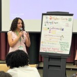 STEM Amb 2025 Newsroom Article - 33 A person talks into a microphone about Hudson County's Agenda