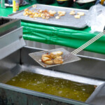 Person frying fish