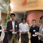 A group of students poses for a photo at Harvest IFNH