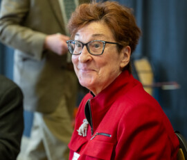 A close up photo of a person smiling