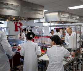 Salome Papaspyrou Rao, assistant teaching professor in the Department of Nutritional Sciences, overseeing the workstations in the Teaching Kitchen during the Spring 2026 Recipe Day.